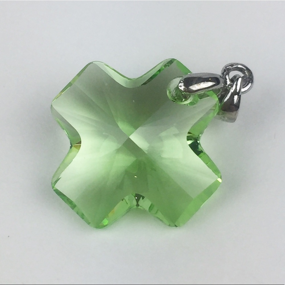 Green Crystal cross pendant, adds sparkle to faith